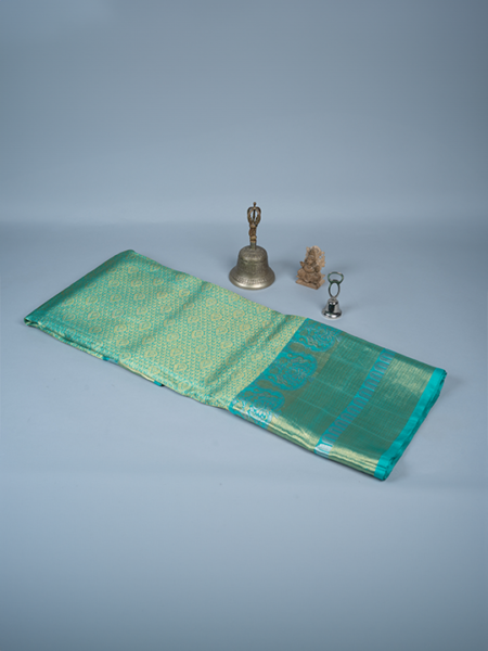 Venkatagiri pattu (yellow)saree with all over silver zari, plain (magenta pink) blouse with border