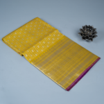 Venkatagiri pattu (yellow)saree with all over silver zari, plain (magenta pink) blouse with border