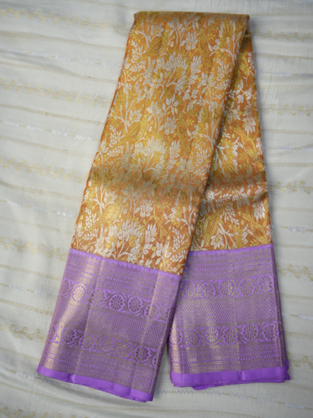Kanchipuram gold,silver zari with (lavender) border, contrast plain tissue blouse with border